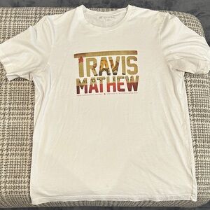 Travis Mathew White and Gold Graphic Tee